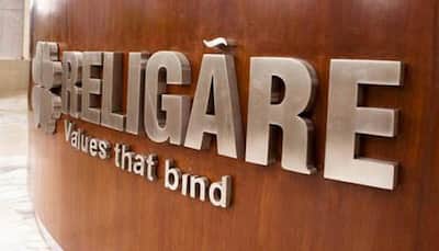 Religare exits mutual fund biz, sells 51% to partner Invesco