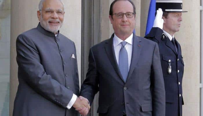 Modi meets French minister, hopes for success of climate summit