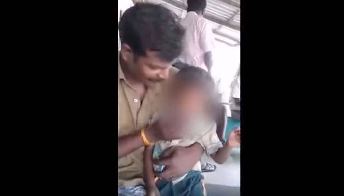 Watch: Man encourages little kid to smoke, latter coughs it out