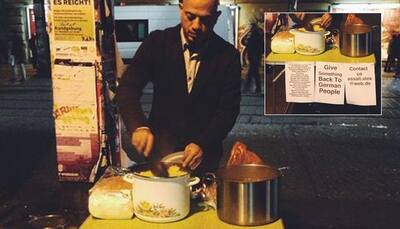 Syrian 'pays back' to Germany by feeding Berlin's homeless