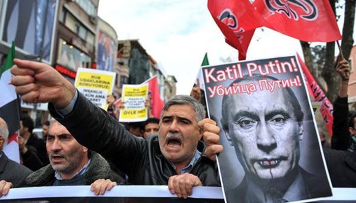 Russia-Turkey war of words escalates over downed warplane