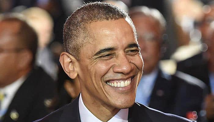 Climate pact an 'act of defiance' after Paris attacks: Obama
