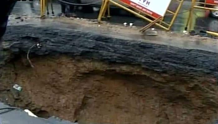 Fresh spell of rains batter Chennai, major road caves in; schools, colleges remain closed