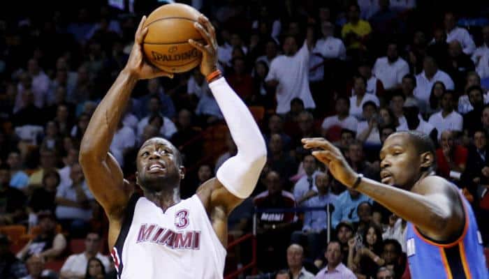 Dwayne Wade makes clutch free throws as Miami Heat beat OKC