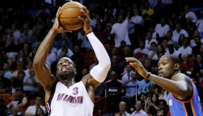 Dwayne Wade makes clutch free throws as Miami Heat beat OKC