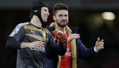 Olivier Giroud atones to move Arsenal up to second
