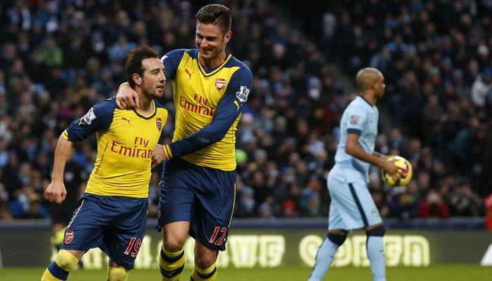 Arsenal's Santi Cazorla out for three months after knee operation