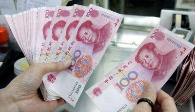China's foreign reserves fall to $3.44 trillion, a near three-year low