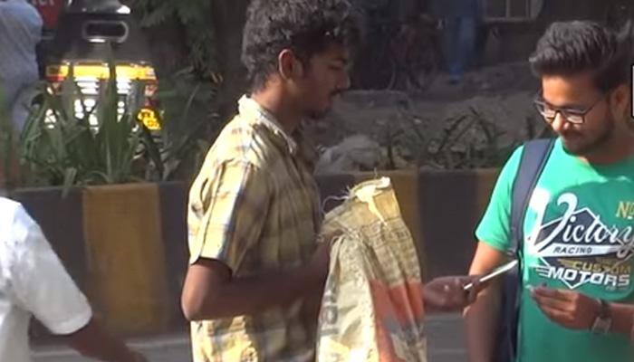 This beggar has an iPhone, he just needs recharge – Don't miss the video 