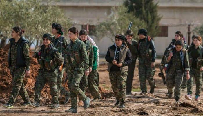 "I'm fighting to protect their future": This woman leaves children behind to fight ISIS