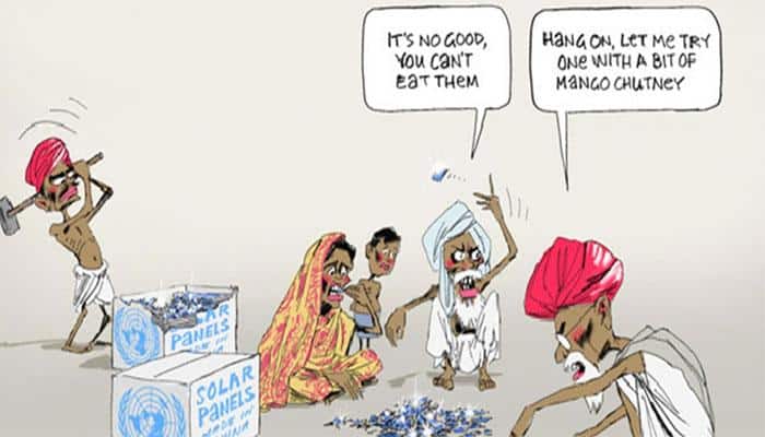 Racist much? Australian daily&#039;s cartoon shows Indians eating solar panels!