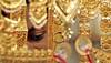 Gold futures slide on weak global trend
