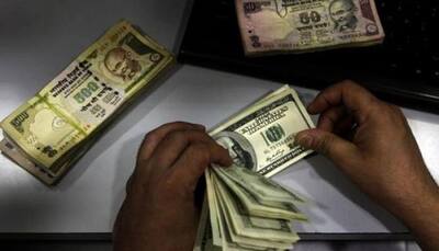Rupee climbs to 3-week high of 66.42 after historic Fed move