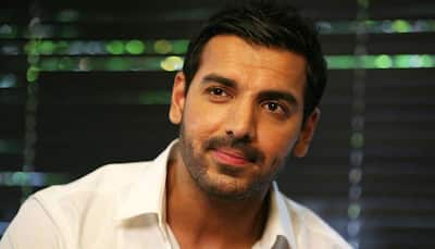 Check out: John Abraham's intense look in 'Rocky Handsome' wielding a gun is out!
