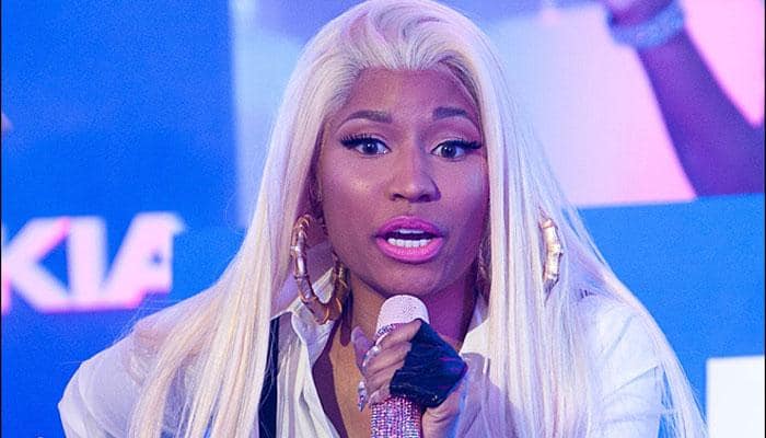 Nicki Minaj performs at concert despite protest