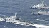 Japan says armed Chinese coastguard ship seen near disputed islands