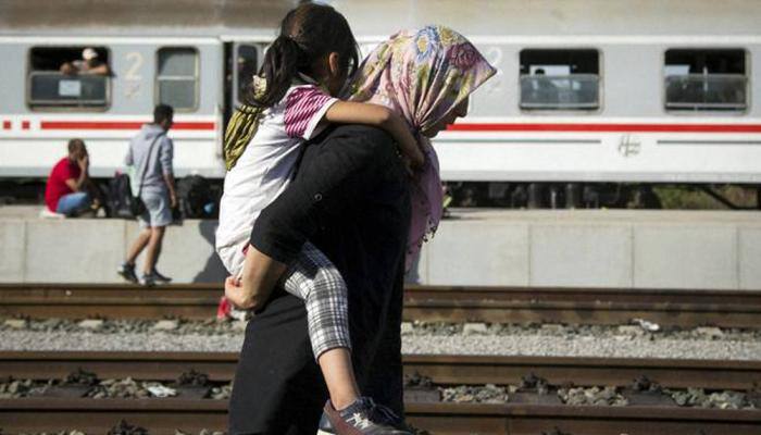 US plans raids to deport families who surged across border