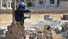 Buses enter Syrian border town to evacuate fighters, civilians under UN deal