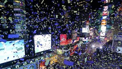 New Year's Eve revelers pack NYC's Times Square under tight security