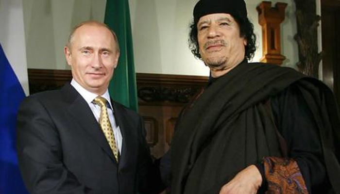 Muammar Gaddafi tried to marry son to Vladimir Putin's daughter Muammar Gaddafi tried to marry son to Vladimir Putin's daughter