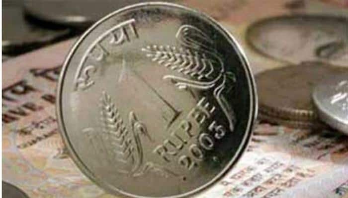 Rupee down 22 paise against dollar in early trade