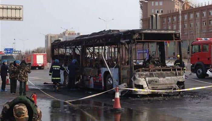 China bus arson suspect threatened violence: Media