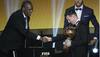 Five-time Ballon d'Or winner Lionel Messi presented with platinum football boots