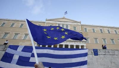 EU warns Greece not to 'play games' with IMF