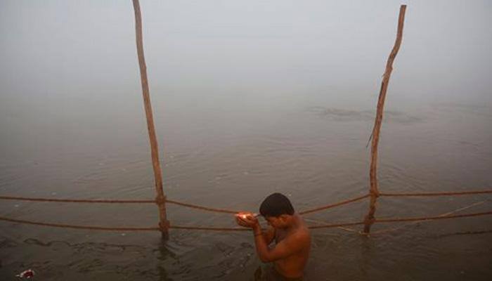 Makar Sankrati: Thousands brave winter for holy dip