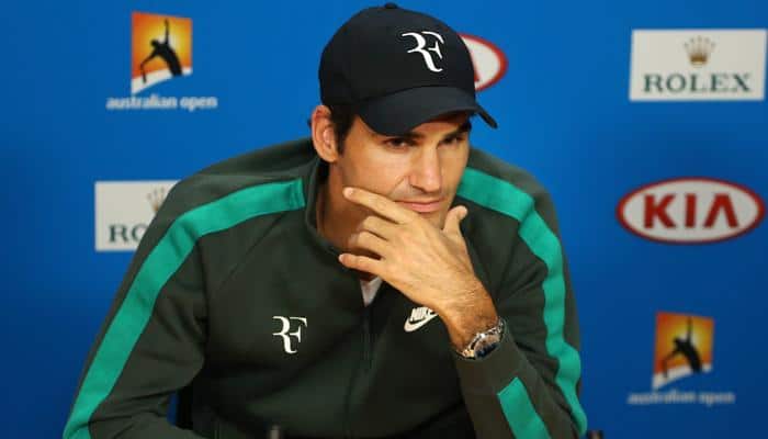 Australian Open: Roger Federer gives defending champion Novak Djokovic 'little star' of approval 