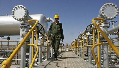 Iran boosts oil production, condemns new sanctions