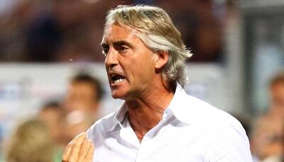 Roberto Mancini sent off as Inter Milan win at Napoli to book last four place