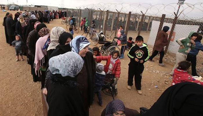 Cash aid for Jordan`s refugees an iris scan away