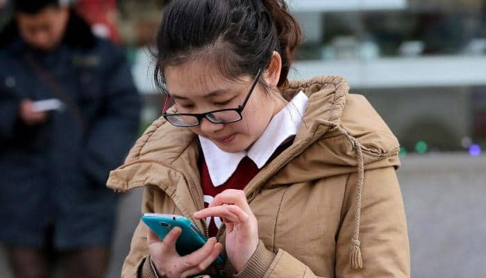 Half of China uses mobile phones to go online