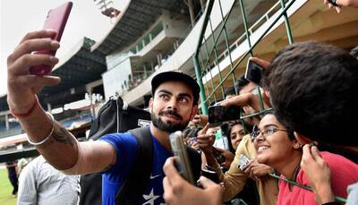 Ladies' man! Virat Kohli bowls over members of India's women's cricket team