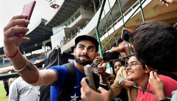 Ladies' man! Virat Kohli bowls over members of India's women's cricket team