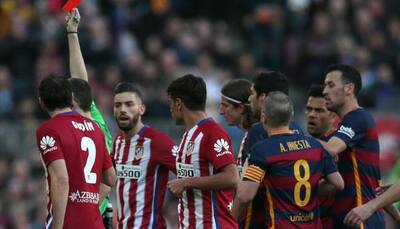 Barcelona beat Atletico Madrid in feisty encounter to move clear in Spain