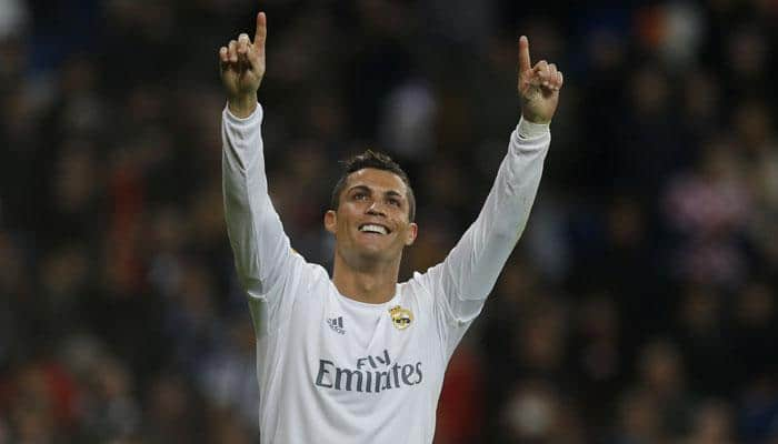 Cristiano Ronaldo hits hat-trick in Real Madrid&#039;s rout, new low for Neville