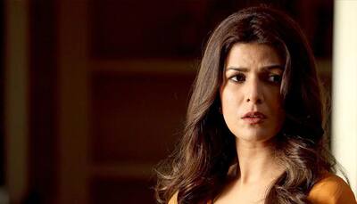 Nimrat Kaur turns red hot on FHM cover—See pic!