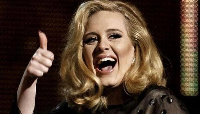 Adele uses throwback picture to promote new single 'When We Were Young'