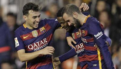 Copa del Rey semi-final: Barca set unbeaten record to see off Gary Neville`s Valencia