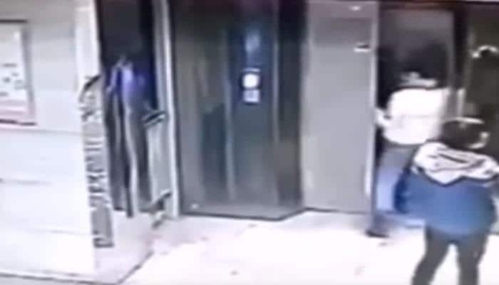 Shocking! Chinese man falls down lift shaft after fly-kicking elevator door - Watch