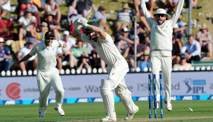 VIDEO: Controversy! Doug Bracewell knocks Adam Voges' stumps over, umpire says not out