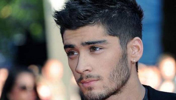 Zayn Malik dyes hair pink!