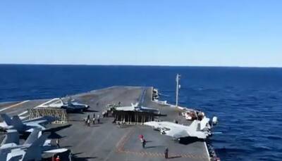 This amazing time-lapse video shows what's the day like on an aircraft carrier