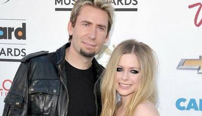 Avril Lavigne, Chad Kroeger show affection at pre-Grammy party