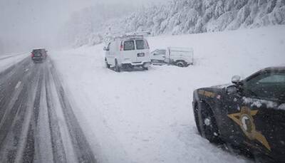 Winter storm hits US East Coast, tornadoes tear into South