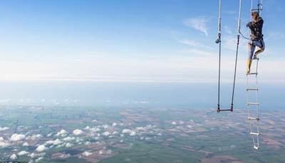 New Zealander Anna Cochrane aims for static trapeze world record – Watch