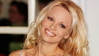Pamela Anderson goes naked to model her cruelty-free shoes