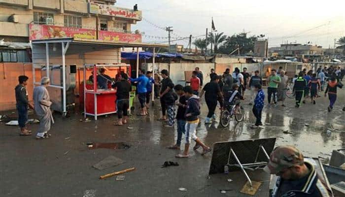 Twin suicide bombing kills 70 in Baghdad's deadliest attack this year